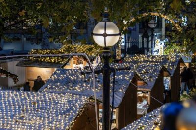 Christmas market stall roofs and Christmas lights at Cathedral Square.